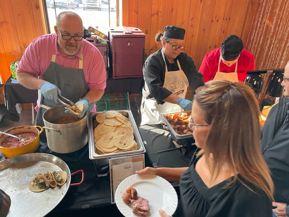 Culinary Capers 2024 serving food