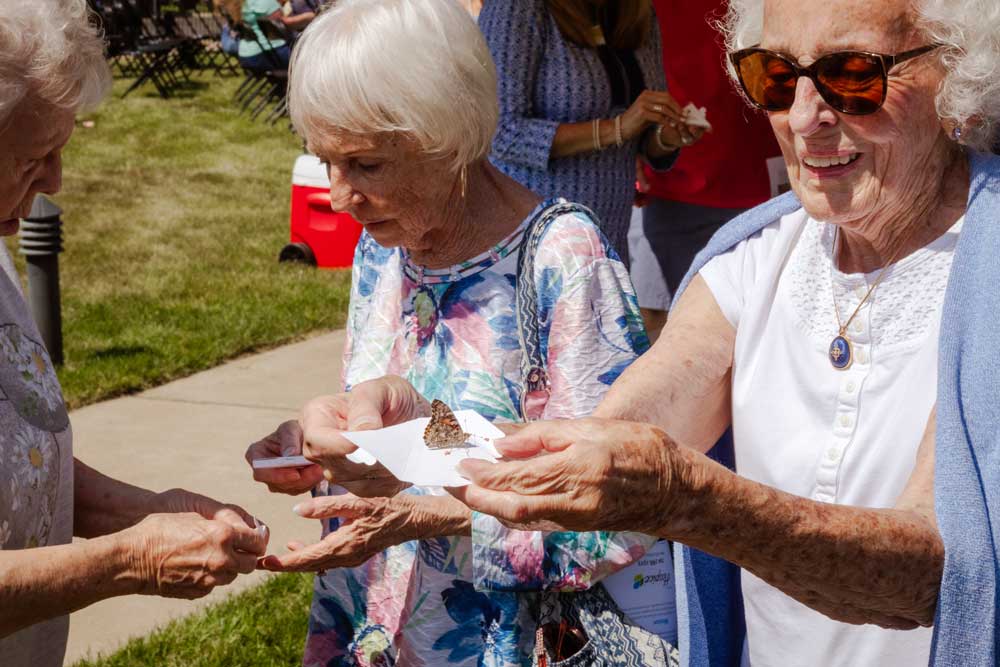 Butterfly Release Newark women releasing butterflies