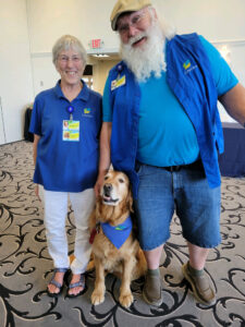 Volunteers With Animal-assisted Pet Therapy Dog